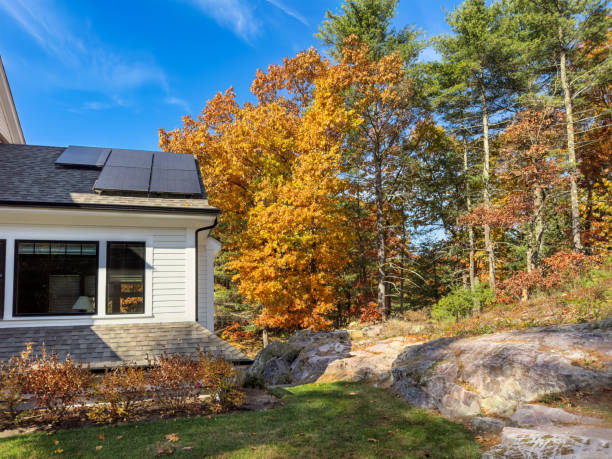 istock Rooftop solar panels on Autumn morning 2180837759