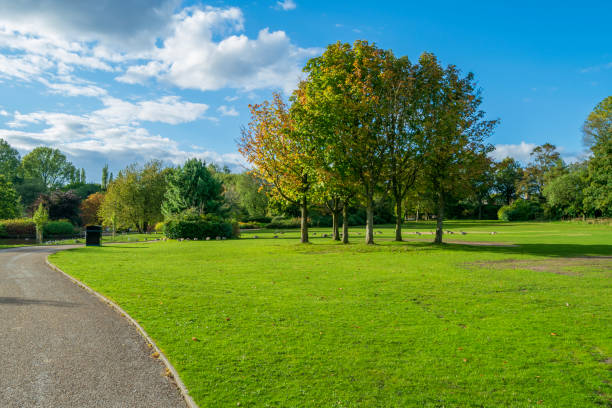 It is a nice park, a little bit large, good enough for biking and walking. There's a play area for kids and a nice little lake with ducks in it, \nIf you want to sit down, there are benches and a large area of grass and trees to play.