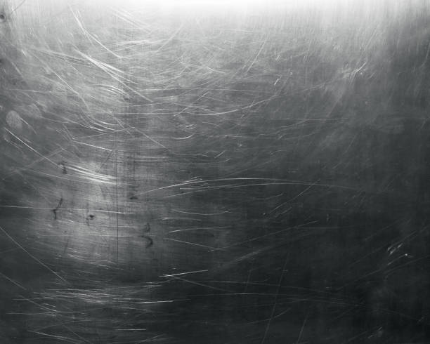istock Shiny scratched metal texture background 2180846072