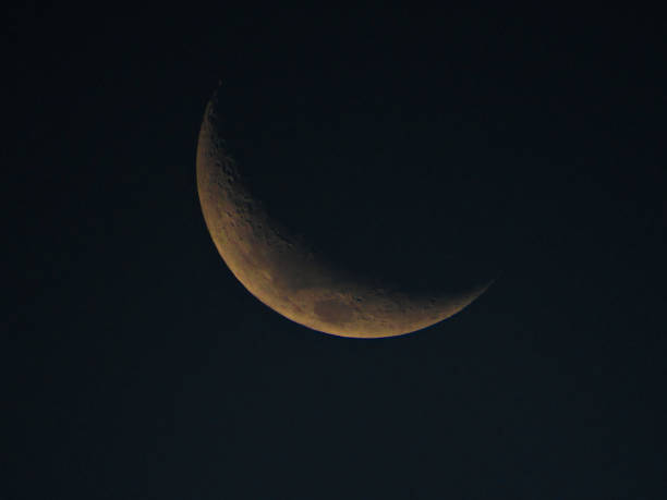 istock Waxing crescent moon observed during blue hour in the southern hemisphere. 2180850987