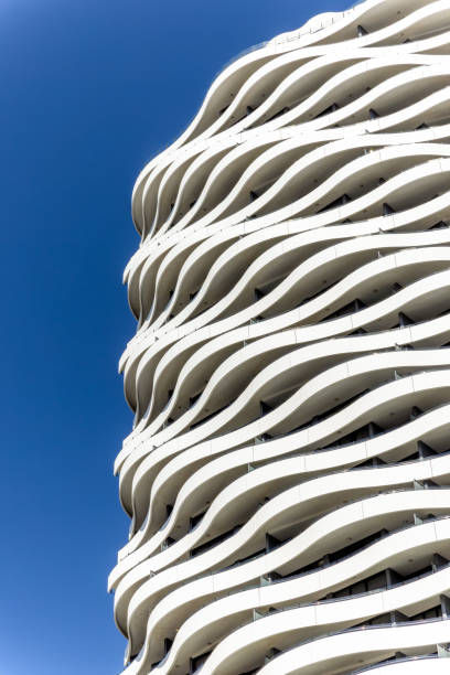 istock Closeup modern apartment building against blue sky, background with copy space 2180856885