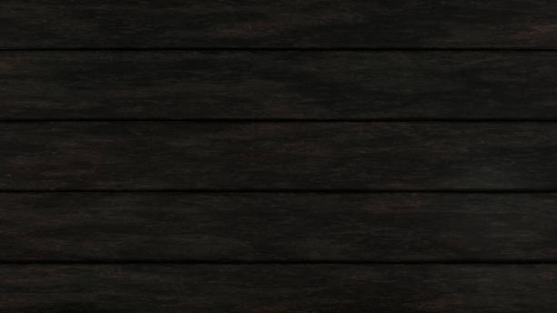 istock Dark wood table top with rustic texture and pronounced grains 2180857086