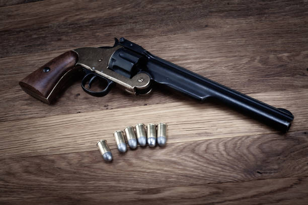 istock Old West .44 caliber single action revolver gun with rounds 2180859527
