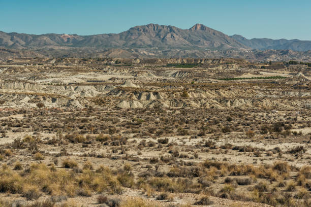 istock Arid mountainous landscape on a sunny day with blue sky. 2180875352
