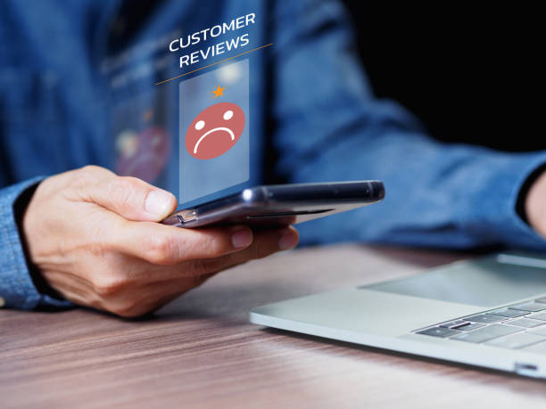 Unhappy user client with sad emotion face on smartphone screen, bad review, bad service dislike bad quality, low rating, social media not good. Customer Experience dissatisfied Concept