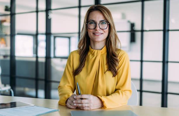 istock Confident businesswoman in modern office. 2180893152