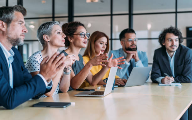 istock Team of professionals during a meeting. 2180893259