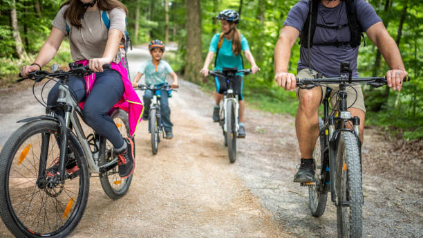 istock Family Cycling Adventure in Forest 2180896758