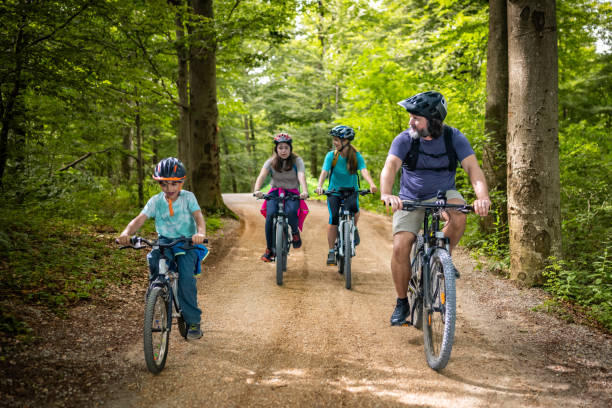 istock Family Bicycle Adventure in Forest 2180896770