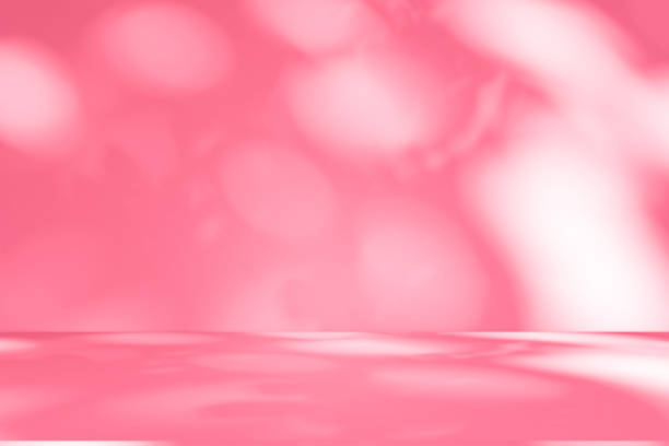 istock Wall interior background, studio, and backdrops show products. with shadow from window color white and pink light. background for text insertion and presentation of product 2180906944