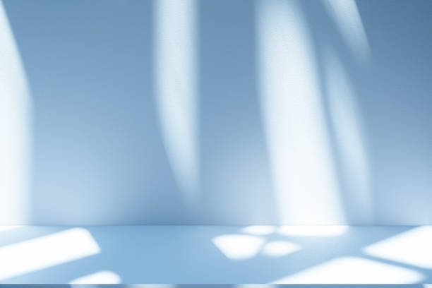 istock Studio style background wall decoration presentation uses white and blue tones. with shadows cast from a nearby window, concept creating a decorative 2180906957