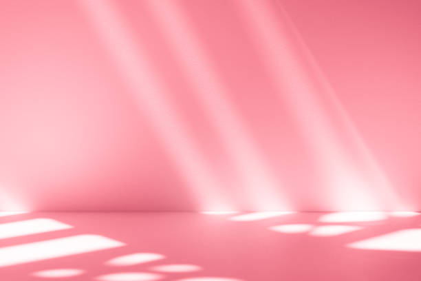 istock Wall interior background, studio, and backdrops show products. with shadow from window color white and pink light. background for text insertion and presentation of product 2180906973