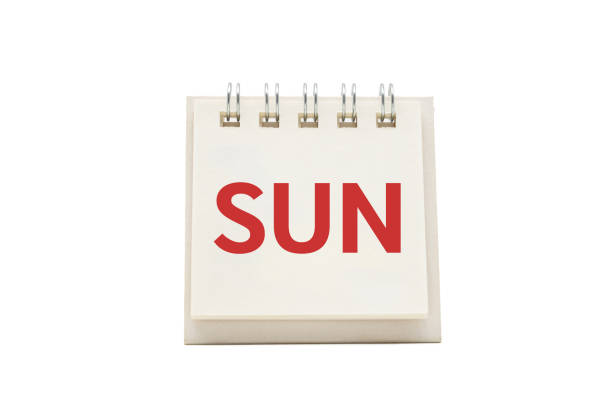 istock SUN text on desk calendar with clipping path isolated on white background. SUNDAY and Calendar concept 2180907132