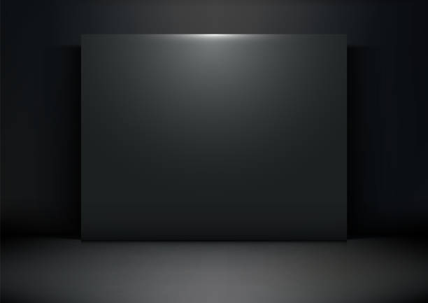 istock Elegant 3D Black Square Backdrop in a Dark Room with Spotlight for Professional Product Mockup and Showcase Presentations 2180912514