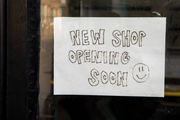 istock Opening soon sign in a shop window 2180913573