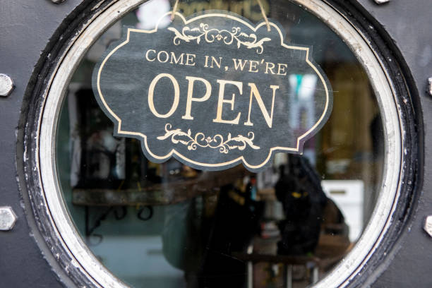 istock Open sign in a shop door window 2180913582