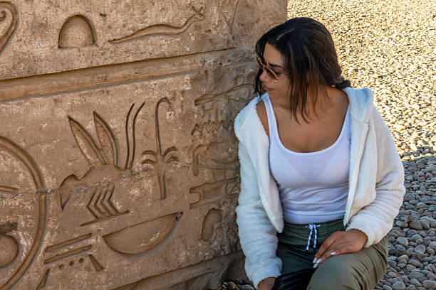 Kom Ombo, Egypt; January 17, 2024: Traveler, immerse yourself in ancient Egypt by deciphering the hieroglyphics of the temple of Kom Ombo. Discovering the mysteries of Sobek, the crocodile god.