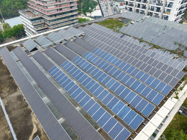 istock Thermal solar panels alternative technologies of water heating and photovoltaic cell in panel on roof top building 2180916213