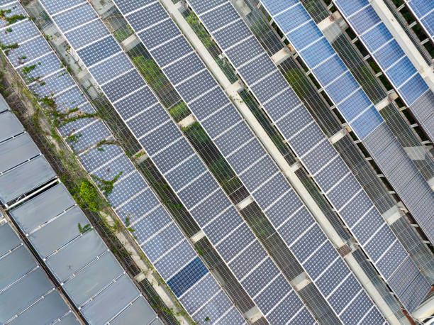 istock Thermal solar panels alternative technologies of water heating and photovoltaic cell in panel on roof top building 2180916308