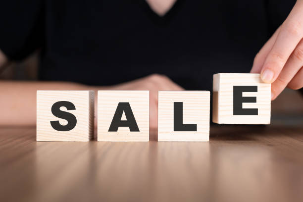 istock Sale word with wooden blocks on table 2180916906