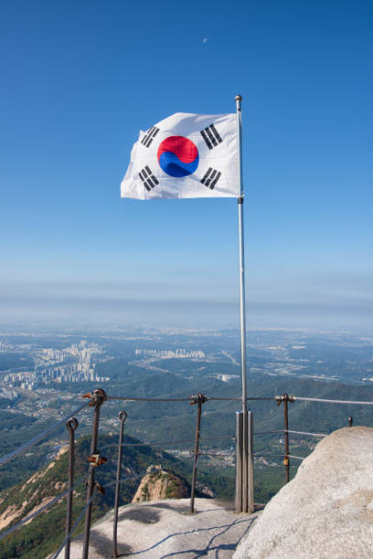 istock Korean Flag Flying on Baegundae Peak 2180919758