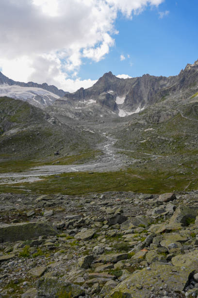 istock Jagged Mountain Peaks and Rocky Alpine Slope 2180921311