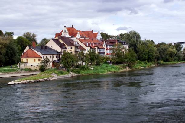 istock Historic buildings by Danube River in Regensburg 2180931258