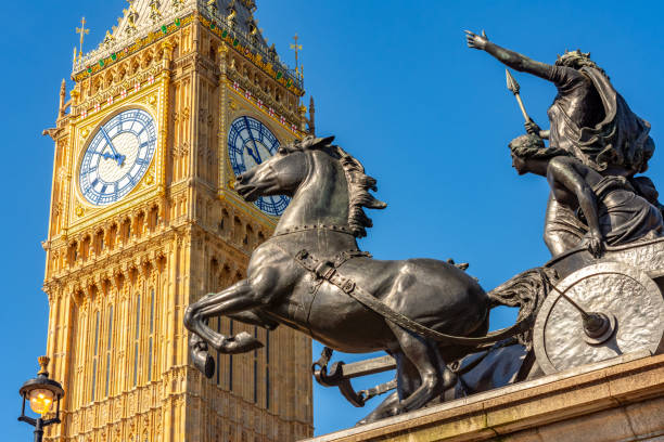 istock Big Ben tower and Boadicea (Victory) monument on Westminster bridge, London, UK 2180932233
