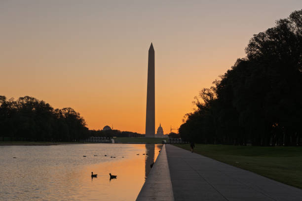 istock Sunrise, Relfecting Pond, National Mall, Washington Monument, Washington DC 2180933220