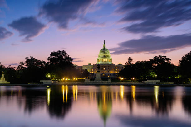 istock The Capitol building in Serene Blue Hour Reflections at Sunrise. Sunrise from reflecting pool, Washington, D.C. 2180933249