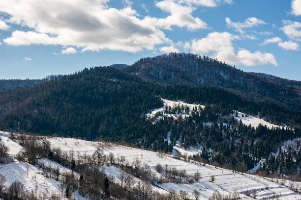 istock winter landscape of mountainous countryside 2180936599