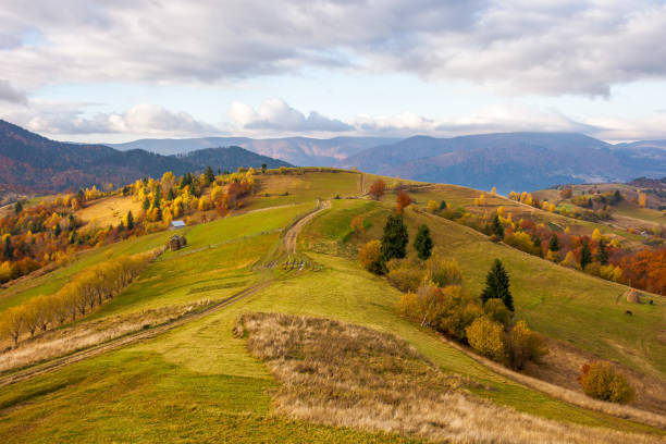 istock mountainous rural landscape in autumn 2180936722