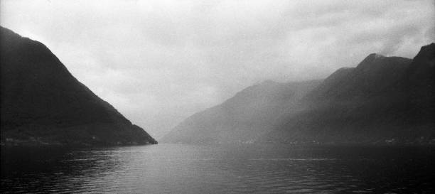 istock Serene mountain landscape with calm lake in black and white 2180942721