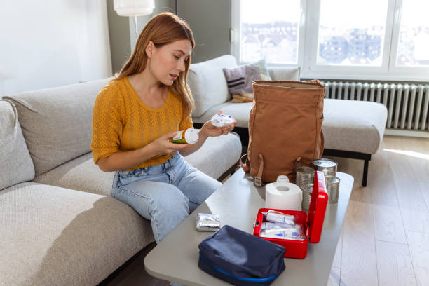 istock Photo of a woman with emergency kit essentials 2180960453