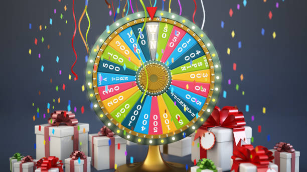 istock Colorful prize wheel surrounded by wrapped gifts and raining confettis in a festive setting 2180961813