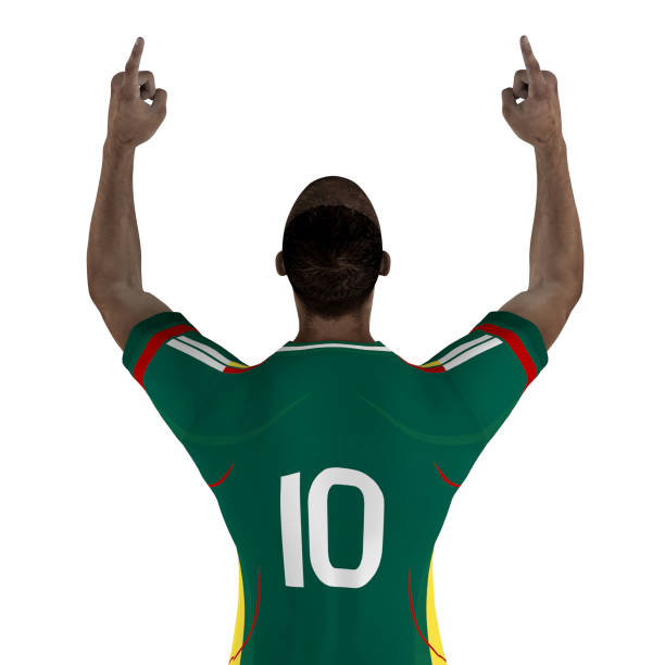 3D image of a soccer player, wearing a green shirt, celebrating with his fingers pointing to the sky. Isolated on white background.