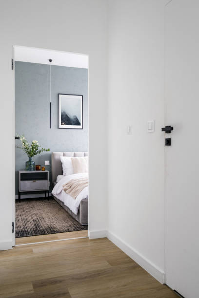 istock Minimalist interior of white apartment with cozy bedroom 2180973468