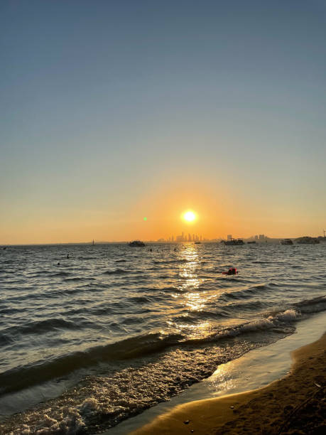 istock Sunset at the beach at Toronto Island 2180973591