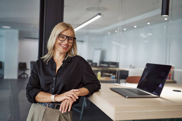 istock A Confident and Ambitious Professional Woman Working in a Modern Office Setting to Thrive 2180973907