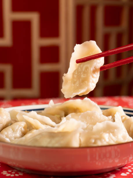 istock Celebrating Chinese New Year with dumplings and dumplings 2180974264