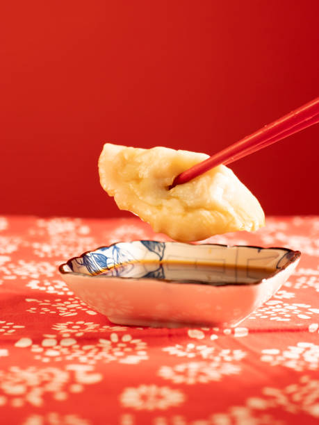 istock Celebrating Chinese New Year with dumplings and dumplings 2180974377