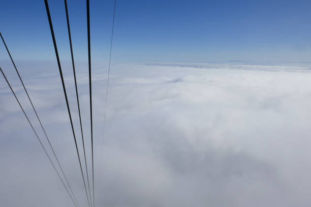 The Table mountain is a flat-topped  mountain forming a prominent landmark  overlooking the city of Cape Town.
