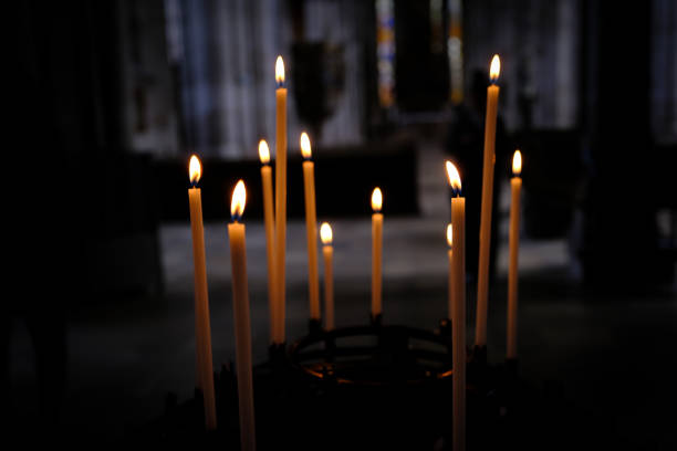 Votive prayer candles inside a catholic church