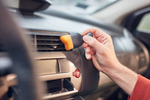 istock Cleaning ordinary dusty car interior and ventilation. 2180994006