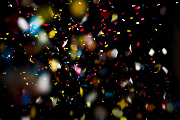 Colored confetti falling on floor