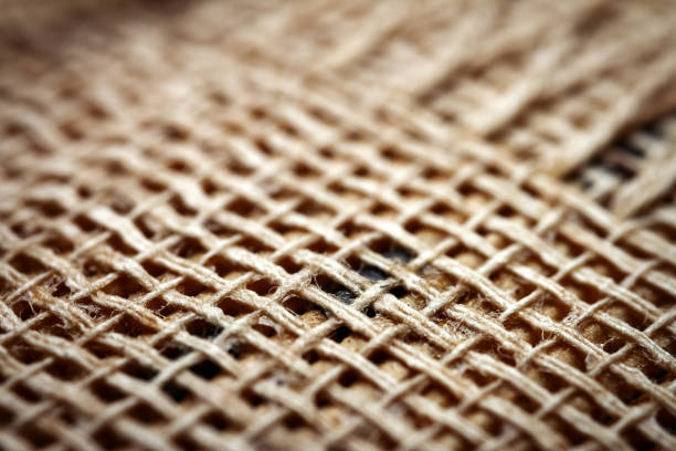 A simple brown burlap pouch is laid flat, showcasing its textured surface and natural fibers.