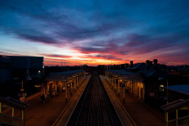 sunrise light in a British railway station, shot on a footbridge