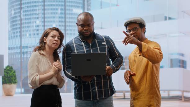 istock Business professionals strategizing an office relocation during a tour 2181007490