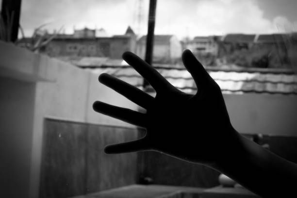istock Hands stuck to the surface of the window glass 2181013464