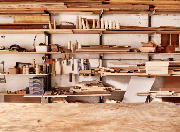 istock Shelves in woodwork workshop with various wooden items and tools 2181014593